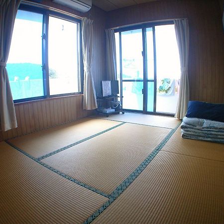 Minshuku Yadokari Hotel Замами Екстериор снимка